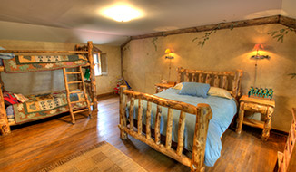 bedrooms_titile-mainhouse_upstair-bedroom-b